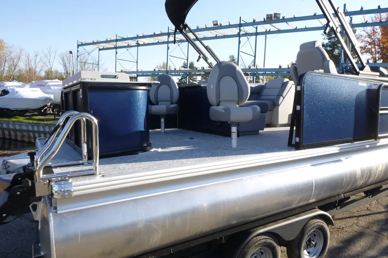 Slide: The Image of 2027 Premier 210 Sunsation Angler 4PT - CL pontoon boat with seating and storage. - 2