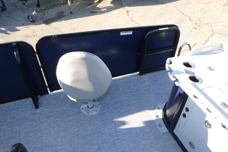 Slide: The Image of 2027 Premier 210 Sunsation Angler 4PT boat interior with seating and storage compartments. - 21