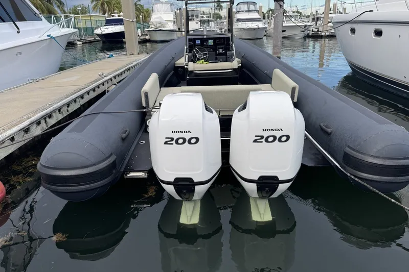 Slide: The Image of Seawater PHANTOM 280 boat with dual Honda 200 engines docked at marina, 2023 model. - 21