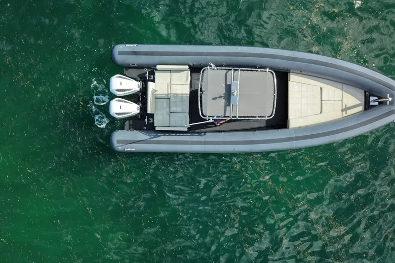 Slide: The Image of Aerial view of 2023 Seawater PHANTOM 280 boat on green water. - 12