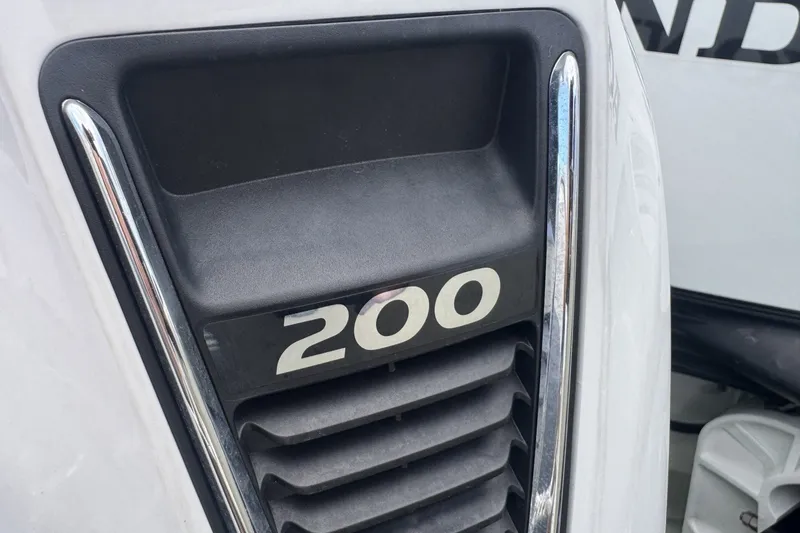 Slide: The Image of Close-up of Seawater PHANTOM 280 engine detail with "200" marking, 2023 model. - 15