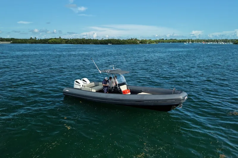 Slide: The Image of Seawater PHANTOM 280 boat cruising on a sunny day, 2023 model. - 5