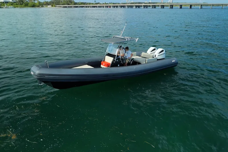 The Image of 2023 Seawater PHANTOM 280 boat on calm water, featuring dual Honda engines. - 1
