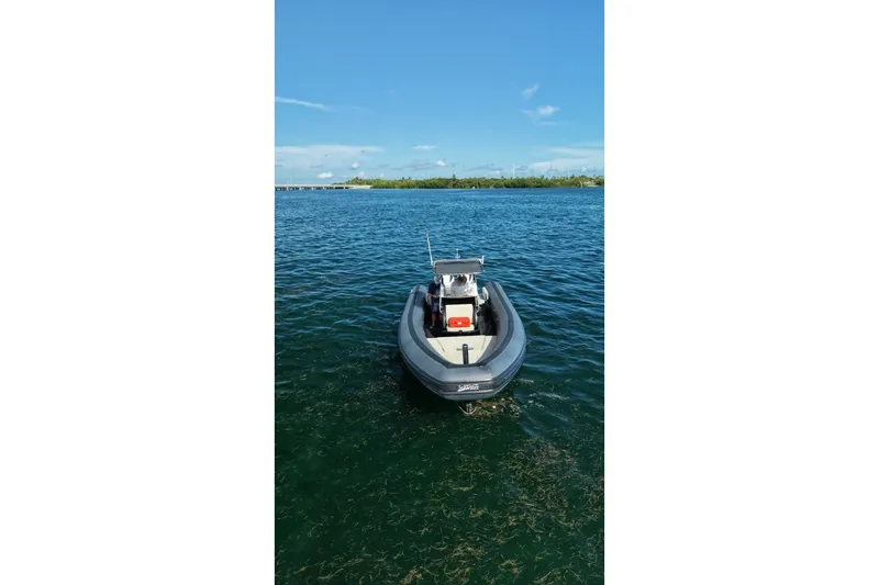 Slide: The Image of Seawater PHANTOM 280 boat on calm blue water, 2023 model. - 22