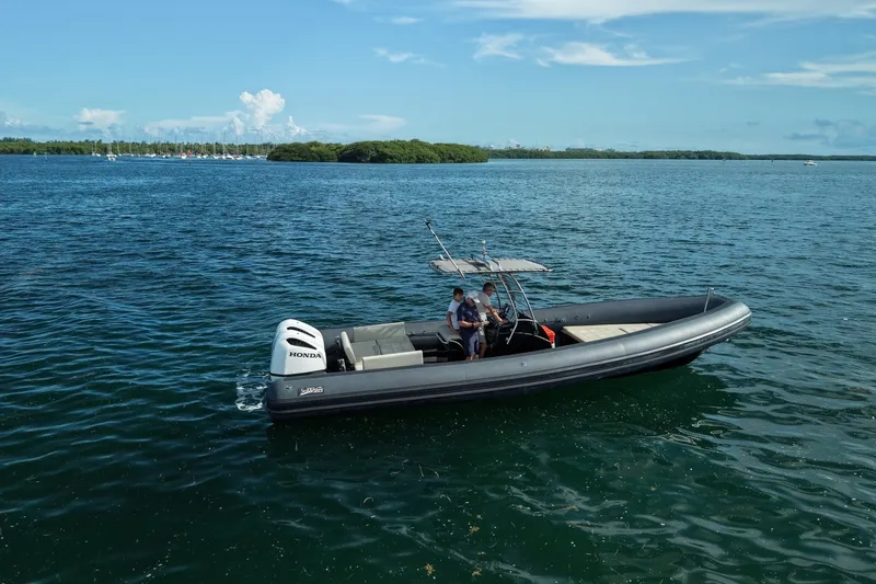 Slide: The Image of Seawater PHANTOM 280 boat cruising on a sunny day, 2023 model. - 4