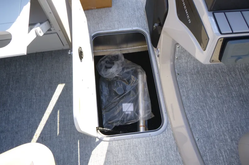 Slide: The Image of Storage compartment in 2027 Premier 210 Sunsation RL - CL boat interior. - 25