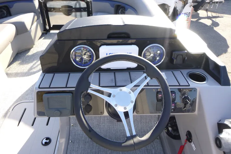 Slide: The Image of Steering console of 2027 Premier 210 Sunsation RL - CL pontoon boat. - 16