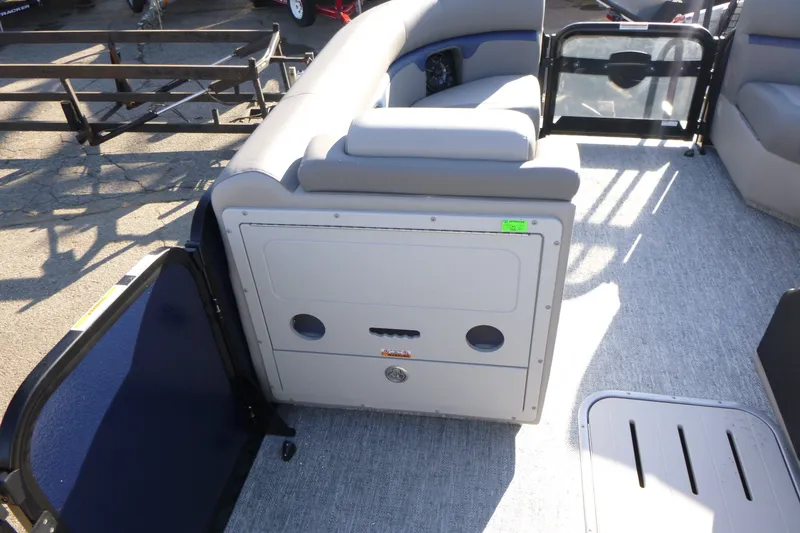 Slide: The Image of 2027 Premier 210 Sunsation RL - CL pontoon boat interior with seating and storage. - 13