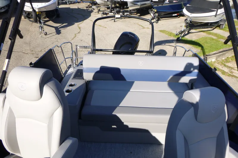 Slide: The Image of 2027 Premier 210 Sunsation RL - CL boat interior with gray seating and cup holders. - 17