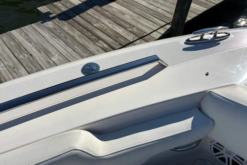 Slide: The Image of 2026 Tiara Yachts 34 LS boat detail near wooden dock. - 22
