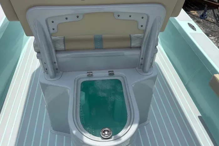 Slide: The Image of 2024 Exuma 22 boat interior with seating and livewell. - 14