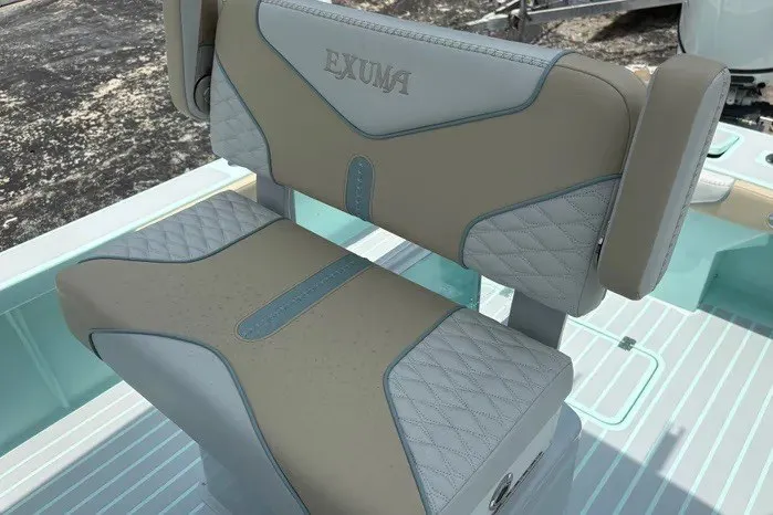 Slide: The Image of 2024 Exuma 22 boat seat with beige and gray quilted upholstery. - 28