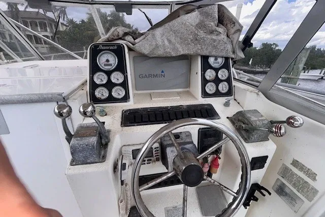 Slide: The Image of Cockpit of 2000 Shamrock 290 Walkaround with Garmin navigation system and control gauges. - 3