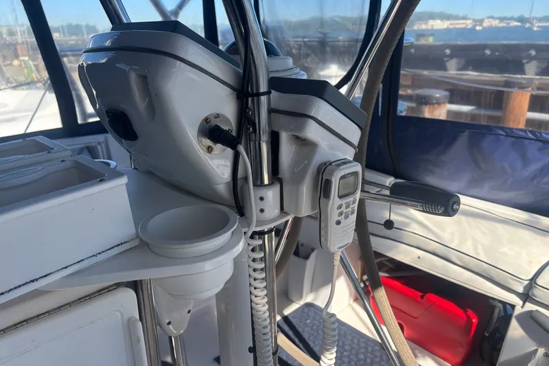 Slide: The Image of Cockpit of 2008 Hunter 41 Deck Salon with navigation equipment and controls. - 6