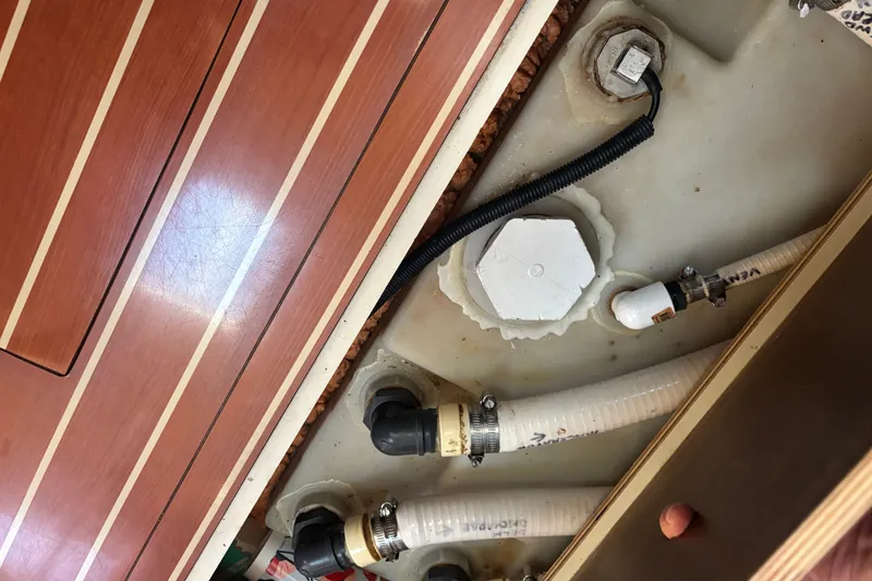Slide: The Image of 2008 Hunter 41 Deck Salon interior plumbing and flooring details. - 27