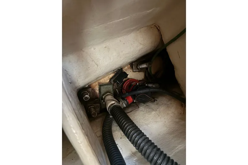 Slide: The Image of Electrical wiring and components inside a 2008 Hunter 41 Deck Salon boat. - 26