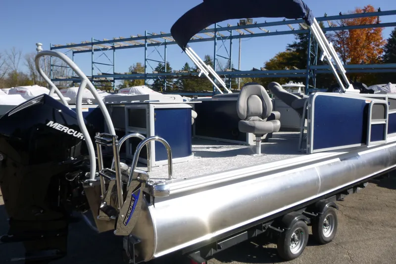 Slide: The Image of 2027 Premier 230 Sunsation Angler 2PT - CL pontoon boat with Mercury engine on trailer. - 3