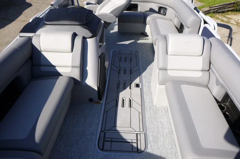 Slide: The Image of Interior view of 2027 Premier 230 Sunsation Angler 2PT - CL pontoon boat with gray seating. - 16