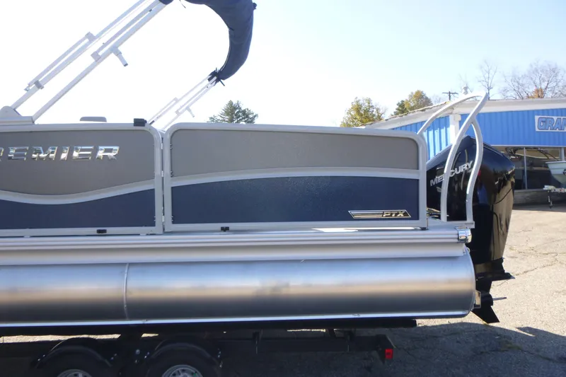 Slide: The Image of 2027 Premier 230 Sunsation Angler 2PT - CL pontoon boat with Mercury engine, side view. - 9