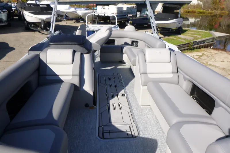 Slide: The Image of Premier 230 Sunsation Angler 2PT - CL 2027 pontoon boat interior with gray seating. - 15