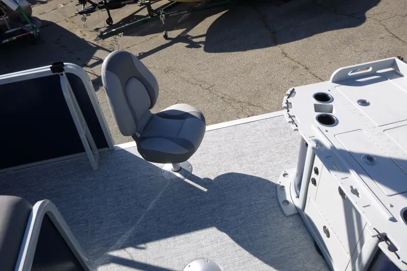 Slide: The Image of Premier 230 Sunsation Angler 2PT - CL 2027 boat interior with seating and console. - 31