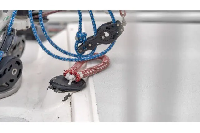 Slide: The Image of Close-up of sailing ropes and pulleys on a 2005 J Boats J/100 yacht. - 27
