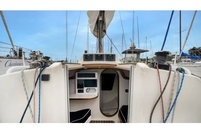 Slide: The Image of 2005 J Boats J/100 sailboat cockpit with ropes and navigation equipment. - 17