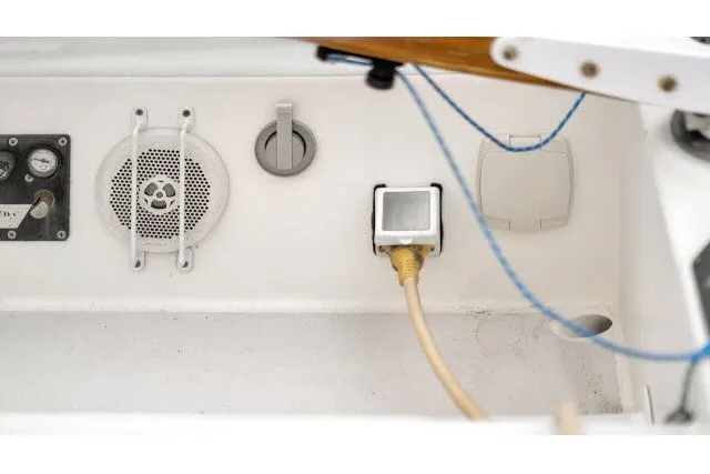 Slide: The Image of Control panel and speaker on 2005 J Boats J/100 sailboat. - 12