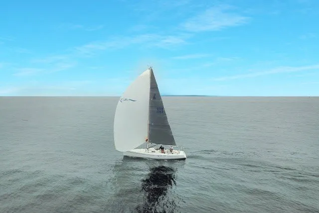 Slide: The Image of Sailing yacht J Boats J/100 2005 gliding on calm ocean under clear blue sky. - 37