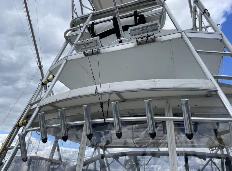 Slide: The Image of Fishing tower with multiple rod holders and sturdy metal frame. - 12