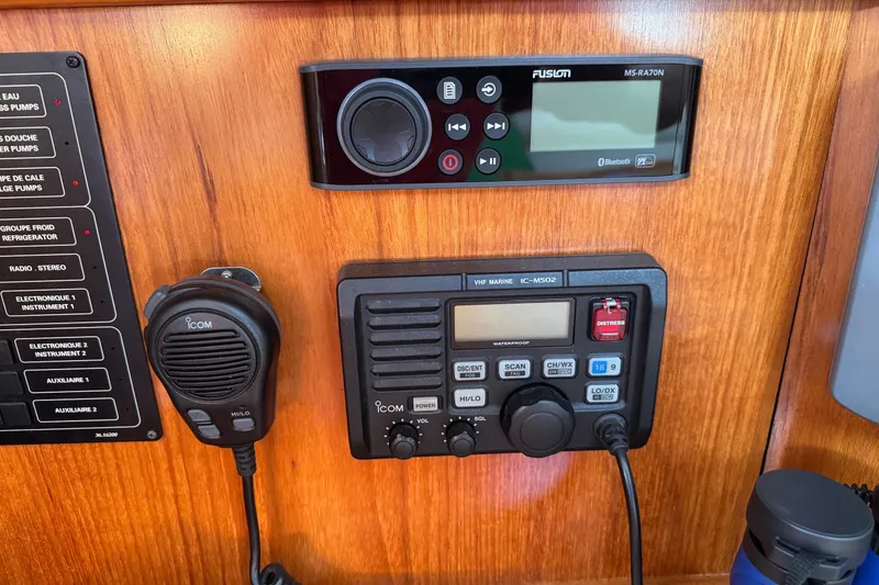 Slide: The Image of Control panel of a 2004 Jeanneau Sun Odyssey 37 with radio and audio systems. - 11