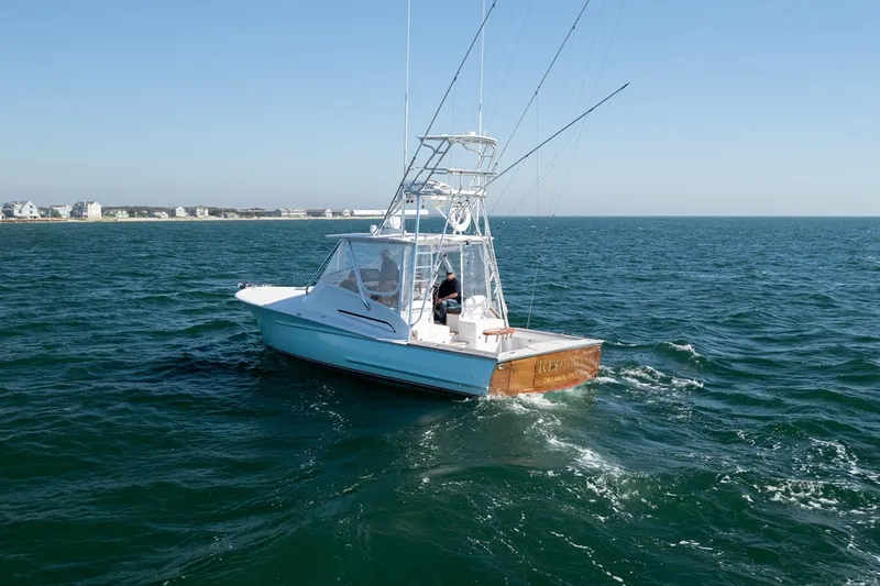 Slide: The Image of A 2017 Lightning Custom Yachts 37 Express Sportfish on open water. - 14