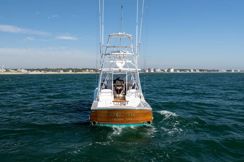 Slide: The Image of Rear view of a 2017 Lightning Custom Yachts 37 Express Sportfish on the sea. - 9