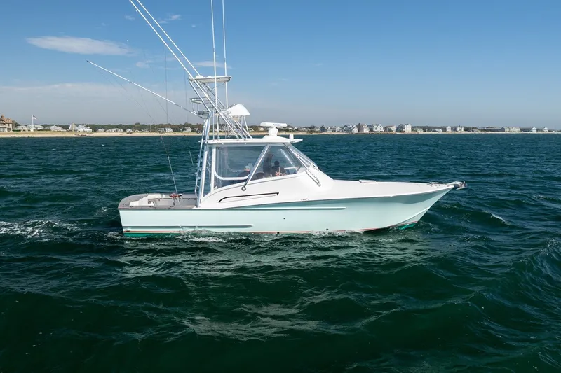 Slide: The Image of 2017 Lightning Custom Yachts 37 Express Sportfish on the water. - 12