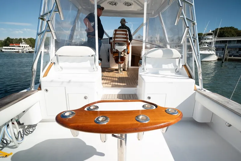 Slide: The Image of The image shows the cockpit of a 2017 Lightning Custom Yachts 37 Express Sportfish. - 20