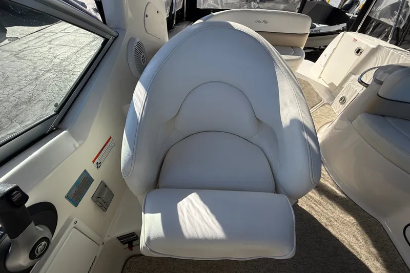 Slide: The Image of White captain's chair on 2008 Sea Ray Sundancer 260 boat interior. - 14