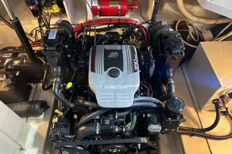 Slide: The Image of Engine compartment of a 2008 Sea Ray Sundancer 260 with a Mercury 350 engine. - 43