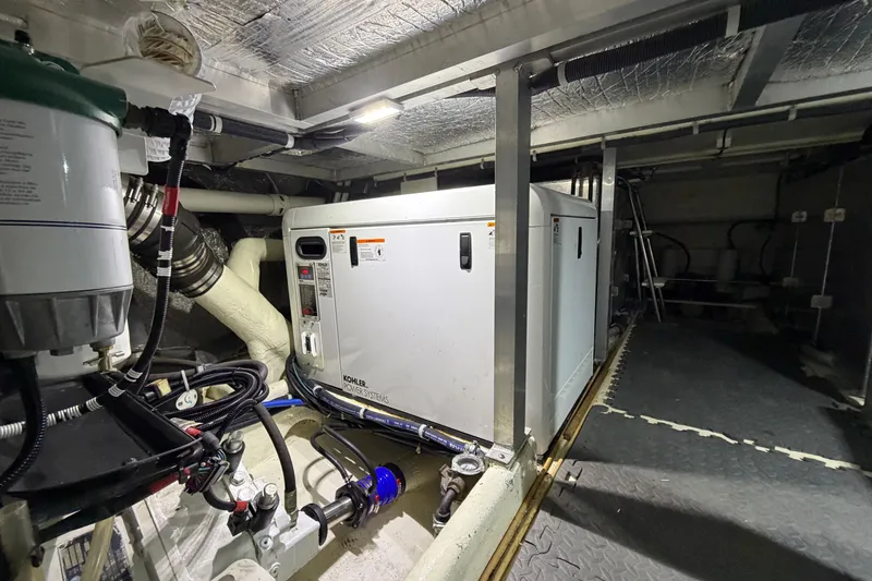 Slide: The Image of Engine room of 2009 Navigator 5800 Pilothouse MY with Kohler power system. - 27