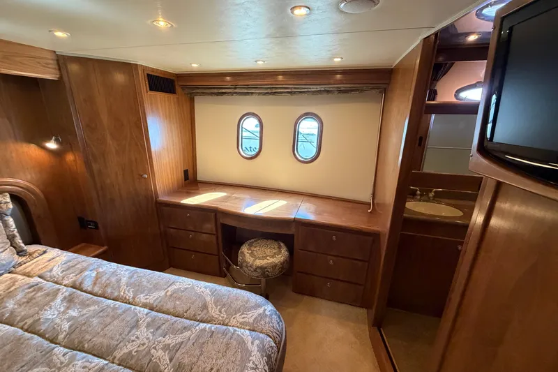 Slide: The Image of Luxurious 2009 Navigator 5800 Pilothouse MY cabin with wood furnishings and porthole windows. - 15
