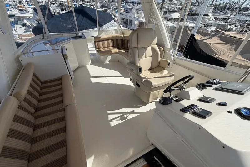 Slide: The Image of Luxurious 2009 Navigator 5800 Pilothouse MY yacht interior with helm and seating area. - 22