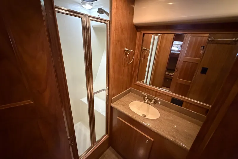 Slide: The Image of Luxurious bathroom in 2009 Navigator 5800 Pilothouse MY with shower and vanity. - 16