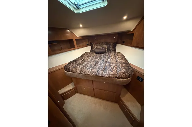 Slide: The Image of Luxurious bedroom interior of 2009 Navigator 5800 Pilothouse MY yacht with elegant bedding. - 19