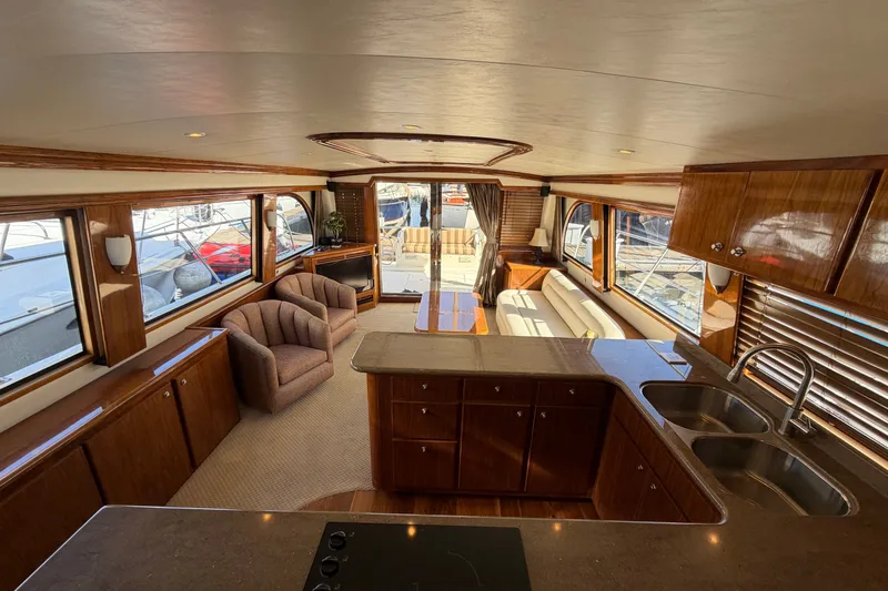 Slide: The Image of Luxurious interior of 2009 Navigator 5800 Pilothouse MY yacht with elegant wood finishes. - 7