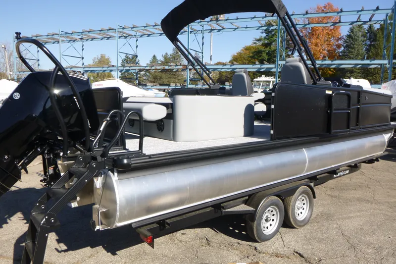 Slide: The Image of 2027 Premier 250 SUNSATION RLO - CL pontoon boat on trailer, outdoor setting. - 30