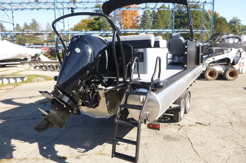 Slide: The Image of 2027 Premier 250 Sunsation RLO-CL pontoon boat with Mercury outboard engine on trailer. - 6