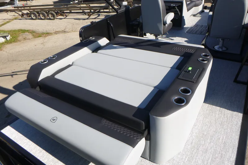 Slide: The Image of Luxurious seating on 2027 Premier 250 SUNSATION RLO - CL boat with cup holders and sleek design. - 28
