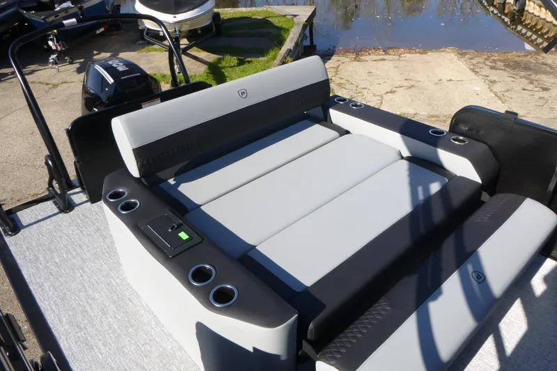 Slide: The Image of Premier 250 SUNSATION RLO - CL 2027 boat with luxurious seating and cup holders. - 27