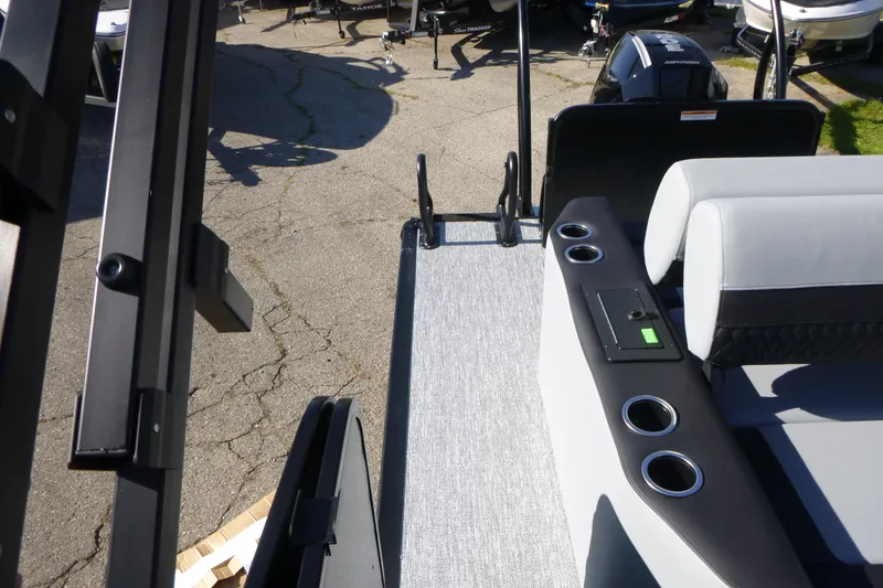 Slide: The Image of 2027 Premier 250 SUNSATION RLO - CL boat interior with seating and cup holders. - 24