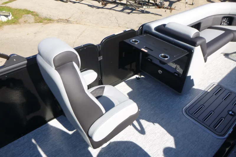 Slide: The Image of Premier 250 SUNSATION RLO - CL 2027 boat interior with seating and storage compartments. - 20