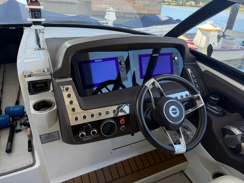 Slide: The Image of The image shows the cockpit of a 2018 Chaparral 337 SSX with modern instruments. - 2